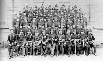 Captain Etienne de Villaret (front row, center), of the Third French Military Mission to Japan, with his officer students of the Ichigaya Military Academy. ThirdFrenchMissionToJapan.jpg