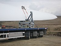 Heavy transport trailer with all-wheel steering remote controlled by a steersman walking at the rear of the trailer (2008). Turbine Blade Delivery to Tower No 11 - geograph.org.uk - 787699.jpg
