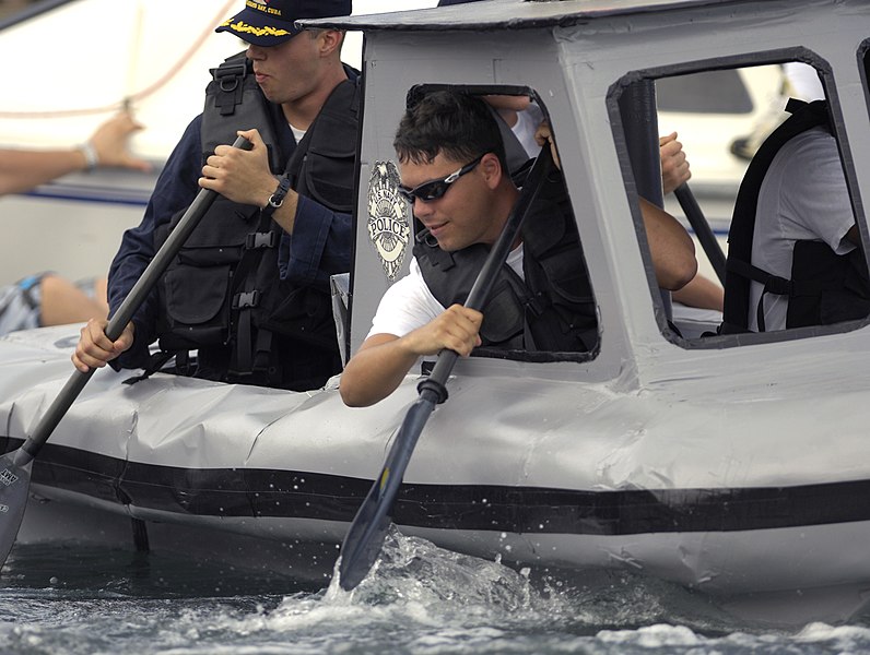 File:US Navy 050611-N-6939M-002 Master-at-arms 3rd Class Timothy Crowley, right, and GTMO 5.0 Commanding Officer, Lt. j.g. Eric Madonia, paddle to a 3rd place victory.jpg