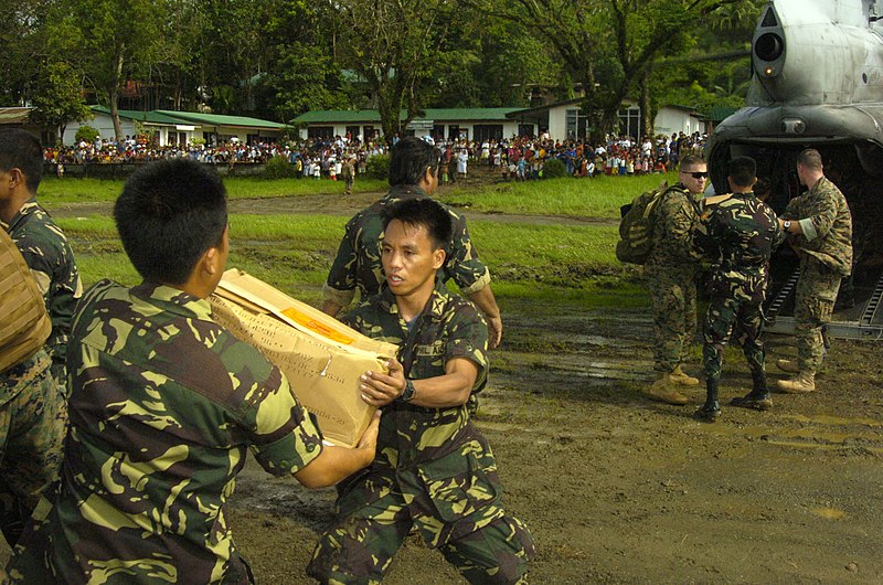 File:US Navy 060219-N-5067K-058 Soldiers from the Republic of Philippines Army offload food, blankets, water and other vital supplies from a CH-46E Sea Knight helicopter assigned to the Flying Tigers of Marine Medium Helicopter Squa.jpg