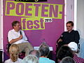 German theater director and blogger de:Ulf Schmidt (Dramatiker) (on the right) at a discussion panel hosted by Florian Felix Weyh at the Erlanger Poetenfest 2015.