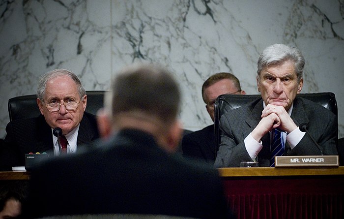 Committee chairman Carl Levin (D-MI) and ranking member John Warner (R-VA) listen to Admiral Mike Mullen's confirmation hearing before the Armed Services Committee to become Chairman of the Joint Chiefs of Staff, July 31, 2007. Levin and Warner died two months apart.