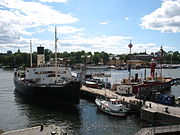 The four floating museum ships moored outside the Vasa Museum.