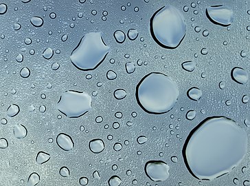 Water droplets on a car sunroof, Mansfield, Massachusetts, US