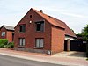 Woningen, voormalige langgestrekte hoeve