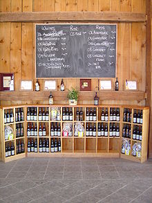 Wine designated as "Cellared in Canada" can be sold in Canadian wine shops as local, domestic wine even though it generally made from foreign grapes. Wine shop in Ontario Canada.jpg