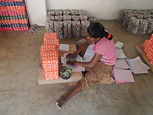 Sri Lankan woman working Woman packing Fireworks Sri Lanka.jpg