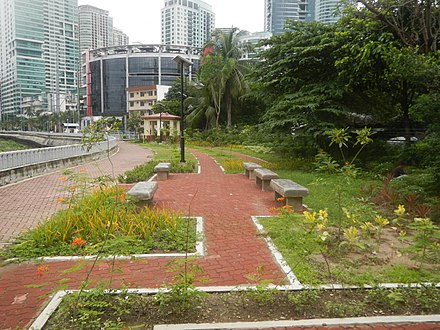 The Poblacion Linear Park with Rockwell Center in the background