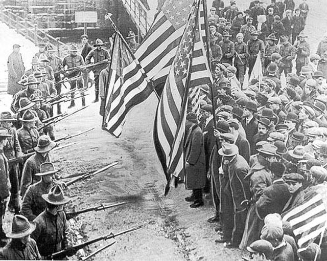 Trade union demonstrators held at bay by soldiers during the 1912 Lawrence textile strike in Lawrence, Massachusetts