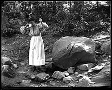 A Woman Drinks at the Carmen Spring, on West 175th Street and Amsterdam Avenue, New York City, by James Reuel Smith, c. 1897-1902