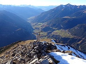 Summit cross on the pre-summit west of the Muchetta