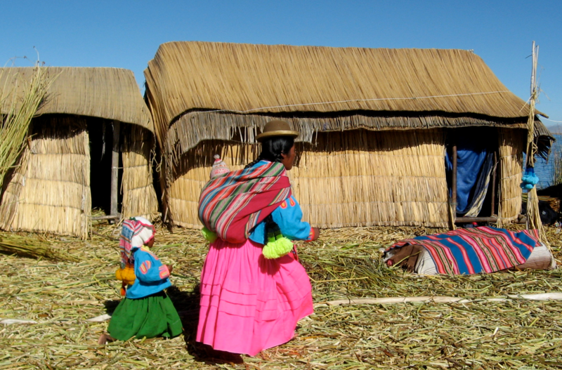 File:Amerindian woman babywearing on lake titicaca.png