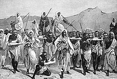 A depiction of slaves being transported across the Sahara desert