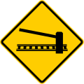 SP-32 Railway crossing ahead with gates or barriers