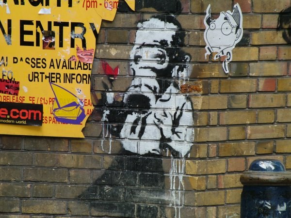 Banksy art on Brick Lane, East End of London, 2004