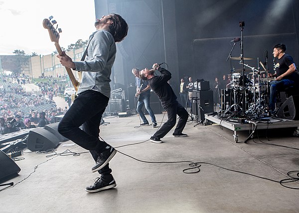 Greg Ginn, Mike Vallely, Tyler Smith, and Isaias Gil performing in Denver, Colorado, 2019