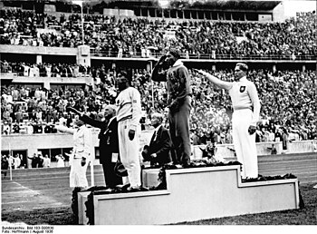 African-American Jesse Owens on the podium aft...