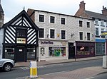 53 and 55 Northgate Butterflies Childrenswear shop, 55,Northgate - geograph.org.uk - 1190326.jpg