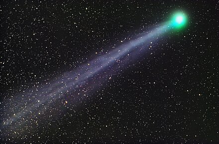 Comet C/2014 Q2 (Lovejoy) surrounded by glowing carbon vapor