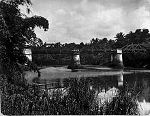 COLLECTIE TROPENMUSEUM Riviergezicht met spoorbrug over de Bantam rivier. TMnr 60005544.jpg