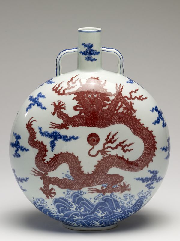 Chinese flask decorated with a dragon, clouds and some waves, an example of Jingdezhen porcelain