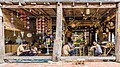 File:Craftmen at work, bamboo basket weaving and textile mobile sculptures, in Heuan Chan heritage house, Luang Prabang, Laos.jpg