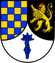 Bügelfibel von Freilaubersheim auf Wappen von Frei-Laubersheim