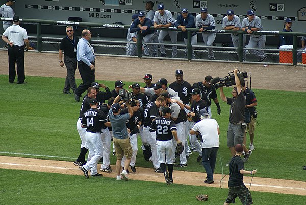 Teammates celebrated Mark Buehrle's perfect game on July 23, 2009.