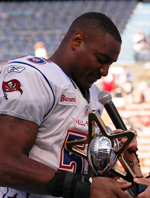 Derrick Brooks with 2006 Pro Bowl MVP trophy 060210-N-4856G-129