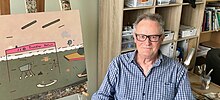 Helmore and his art, taken in 2018 in his Hastings home Des Helmore at home, cropped.jpg