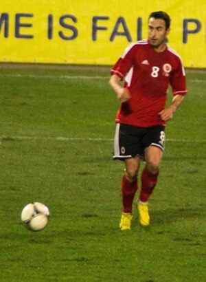 Bulku with the Albania national team in 2013.