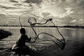 "Fishing_at_Rainy_monsoon.jpg" by User:Khokarahman