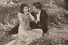 Moore and Landis in a scene from the film Forsaking All Others scene (cropped).jpg