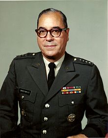 Gen Genwood, Jorj V Jr.jpg