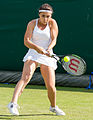 Gabriella Taylor competing in the first round of the 2015 Wimbledon Qualifying Tournament at the Bank of England Sports Grounds in Roehampton, England. The winners of three rounds of competition qualify for the main draw of Wimbledon the following week.