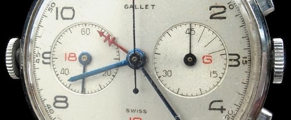 Three complications on a Gallet MultiChron Navigator (1943): a crown-controlled synchronizable second hand, a direction-finding 24-hour hand, and a 45