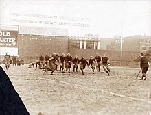 Holy Cross takes on Boston College in 1916 at Fenway Park. BC won the game, 17-14. Holy Cross vs Boston College (Fenway Park 1916).jpg