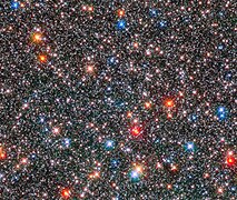 Red giant stars coexist with white, Sun-like stars.[56]