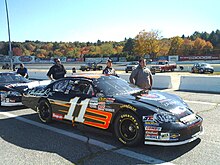 Jesus Hernandez, driving the No. 11 car for Dale Earnhardt, Inc., finished third in the championship. He is the second-to-right person pictured here. Jesus Hernandez DEI Chevrolet Stafford 2008.jpg