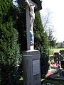 Stone cross in the Gornji Črnci cemetery from 1886