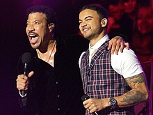 Lionel Richie and Sebastian performing "All Night Long" Lionel Richie and Guy Sebastian.jpg