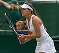 Michelle Larcher de Brito competing in the first round of the 2015 Wimbledon Qualifying Tournament at the Bank of England Sports Grounds in Roehampton, England. The winners of three rounds of competition qualify for the main draw of Wimbledon the following week.