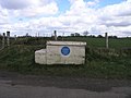 wikimedia_commons=File:Milk churn stand with blue plaque... - geograph.org.uk - 759590.jpg