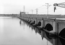 Upstream side of the dam, showing installed gates. Mississippi River Lock and Dam No. 19 rear of dam.jpg