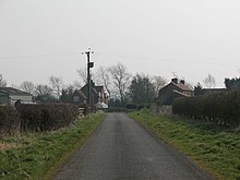 Looking south along Moorhouse Lane into North Kilvington Moorhouse Lane, North Kilvington.jpg