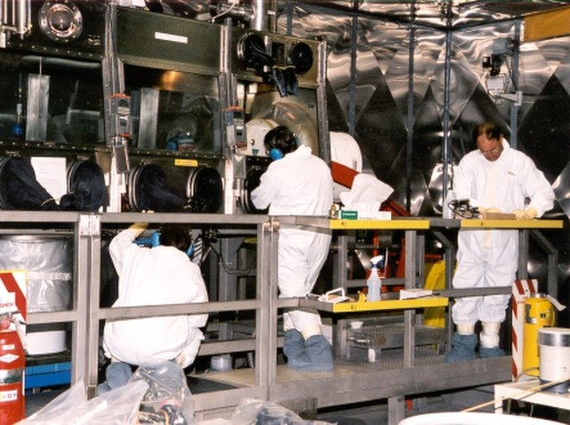 Large scale glovebox in the nuclear industry used to contain airborne radioactive particles.