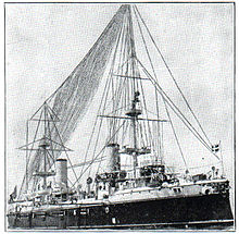 Carlo Alberto with Marconi's antenna strung between the masts. NSRW Italian battleship with telephone wires.jpg