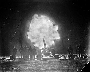 6-inch gun of the Royal Garrison Artillery firing over Vimy Ridge behind Canadian lines at night Naval gun firing over Vimy Ridge.jpg