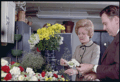 Pat Nixon works with flowers, December 30, 1970