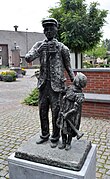 Pintenwipper standbeeld Martinusplein Dommelen